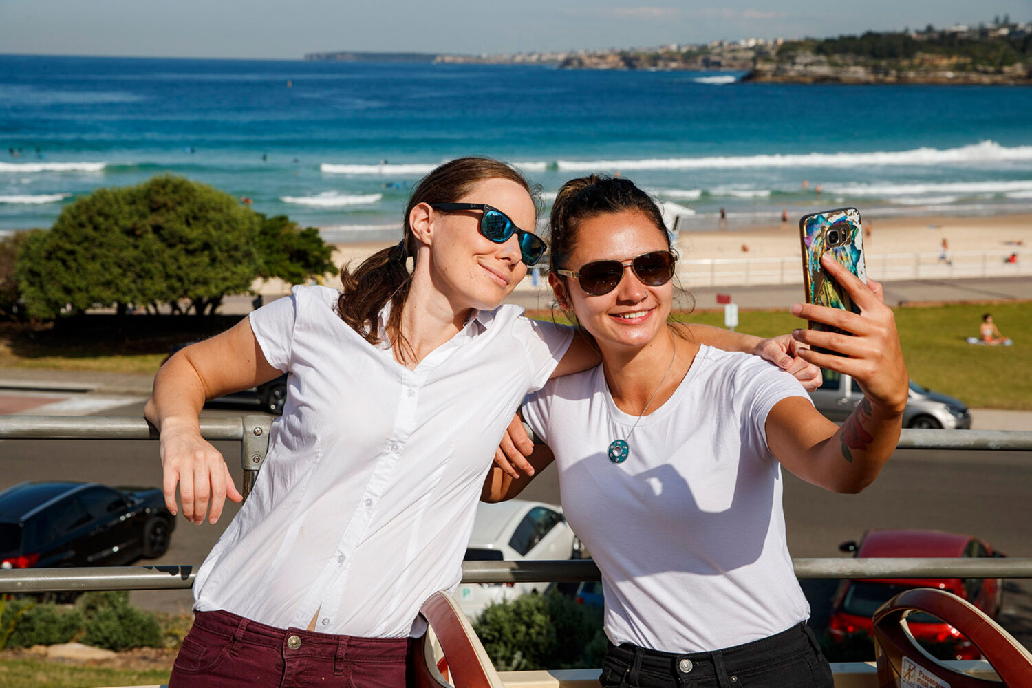 2 women are taking selfies
